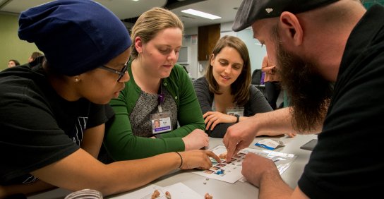 Members of the MD Program studying material