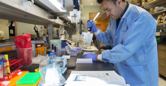 UW School of Medicine researcher performing tests